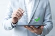 © Jubayer - Procurement process management concept with digital and paper document approval, contract verification, supplier negotiation, and purchasing operations using laptop