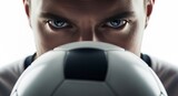 Intense football player close-up with focused expression and white helmet in sports action