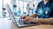 © karina - Doctor using a laptop with a digital stethoscope overlay in a clinic setting