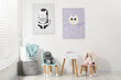© New Africa - Different toys, small chairs, table and pictures in child's room