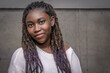© Jacques Durocher - Portrait of young African woman with braids smiling, natural light headshot
