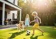 © jescika - Happy children and a golden retriever playing soccer in a sunny backyard with warm golden light