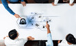 © InfiniteFlow - A group of professionals engages in a collaborative meeting over a table, illustrating business concepts with innovative graphics and icons that symbolize teamwork and strategy. Trope