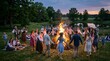 © Duan Akamsad - People dancing around a large bonfire for midsummer celebration