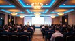 © Masque - Professional business conference hall with blue lighting and rows of attendees.