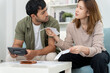 © Shisu_ka - Stressed and headache asian couple with large bills or invoices no money to pay to expenses and credit card debt. shortage, Financial problems, mortgage, loan, bankruptcy, bankrupt, poor, empty wallet