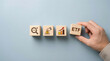 © Gambar - Hand placing ETF block, symbolizing investment growth and financial planning