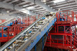 © Mati - Waste conveyor belt with mixed garbage moving through recycling sorting line