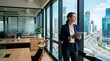 © OlgaNeuroArt - Confident businesswoman looking out window at cityscape. Female corporate executive holding tablet in modern office. Vision and leadership concept