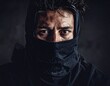 © Lutfi - Intense gaze from shrouded figure
