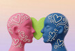 © Artistic Memory - Concetto di amore e unione tra due profili umani con simboli di cuori