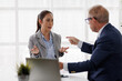 © David - Businesswoman experiencing workplace bullying, stress, and emotional distress from an aggressive male manager's verbal abuse and toxic behavior during a corporate conflict discussion