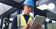 © peopleimages.com - Man, contractor or office with tablet for building maintenance, safety check or security. Male person, technician or engineer with technology or hard hat for installation or checklist in workplace