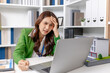 © PHOTO4U - Stressed real estate consultant facing financial problems in office, showing frustration over mortgage calculations, failed property deals, budget pressure, and challenging investment decisions.