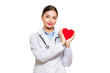 © Oleg Gekman - Young female doctor cardiologist with stethoscope over neck showing heart symbol isolated on white background