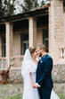 © omelnickiy - bride and groom walking in an abandoned area