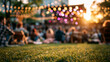 © foto Art - Blurred summer outdoor concert background with grass foreground lake view sunset stage lights and relaxed crowd for lifestyle event design