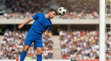 Professional football player jumping high to execute a powerful header with a classic black and white soccer ball.