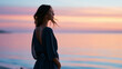 © Nataliya - Female silhouette by ocean during sunrise, healing emotional atmosphere, peaceful self-discovery concept, cinematic realism, dreamy pastel sky, summer travel aesthetic, with copy