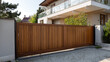 © A2Z AI  - Modern residential property with a sturdy wooden sliding gate, providing privacy and security, set against a contemporary home design
