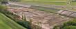 © AmazingAerialAgency - Den Oever, Netherlands - 21 May 2026: Aerial view of solar park construction on the A7 highway embankment near Stevin Sluices as part of the Afsluitdijk renewal project.