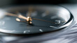 © Kanomaoi - Close up of wristwatch face sitting on top of paperwork stack