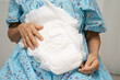 © amazing studio - Asian senior woman patient wearing incontinence diaper.