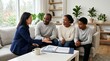 © Николай Срибяник - Financial advisor explains investment plan to a family at home.