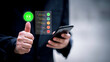 © Oatakoi - Businessman using smartphone to give five-star rating and positive feedback through virtual interface. Concept of customer satisfaction, user experience, review system, and digital feedback.