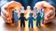 © Ahmed - Protective hands surrounding a circle of wooden human figures representing community support employee care