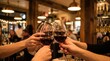 © Bruno Stock - Friends clinking wine glasses in cozy restaurant bar with warm lighting and bokeh background