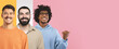 © Prostock-studio - Three men are smiling and posing closely together in a studio setting. They look happy and relaxed, with colorful backgrounds that enhance their friendly appearance.