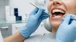 © Moh - Close-up of a smiling person's teeth being examined by a dentist using dental tools in a bright, clean examination room