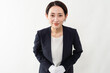 © aijiro - 白手袋をしたビジネススーツの女性　ブランドイメージ