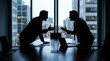 © dhek - Silhouettes of two businessmen arguing