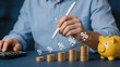 © Benjamin - Financial savings concept with stacks of gold coins increasing in height, percentage growth trend line, calculator and piggy bank representing investment returns.