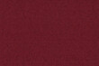 © riorio - Maroon corduroy fabric texture with soft ribbed surface and rich woven textile detail. Ideal for upholstery visuals, fashion backgrounds, and vintage interior design.
