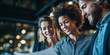 © Robert - Diverse group of professionals sharing ideas in office teamwork