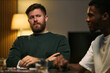 © DragonImages - Young adult Caucasian man and Black man playing cards, interacting during social gathering, expressing male friendship and bonding. Useful for friendship, leisure, community campaigns