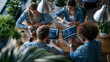 © Kateryna - A  AI startup team viewed from above develops softly bright software in a calm modern office analyzing system performance during QA testing in soft daylight startup