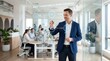 © Safaluna - Businessman Interacting with Futuristic Holographic Display in Modern Office.