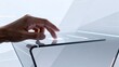 © 斯 李 - Hand interacting with futuristic touch screen