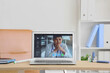 © Pixel-Shot - Video chat with doctor and hormone injection on desk in clinic