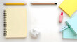 © Heru - flat lay of spiral notebook and colorful office desk supplies