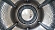 © kinomaster - Close up view of a modern washing machine drum interior with visible details. Concept of household appliances, laundry care, and technology innovation. Generative AI