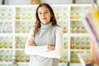 © JackF - Nice girl, an employee of a perfume shop, invites you to go shopping