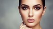 © Trio - Woman with professional makeup portrait close up on gray background