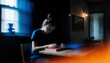 © A Luna Blue - Girl reading book in dimly lit study with window teddy bear