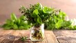 © Jeremy Ai - Fresh Herbs in a Jar on a Wooden Table.