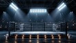 © Henrydavidwillson - A dimly lit boxing ring with bright spotlights shining down